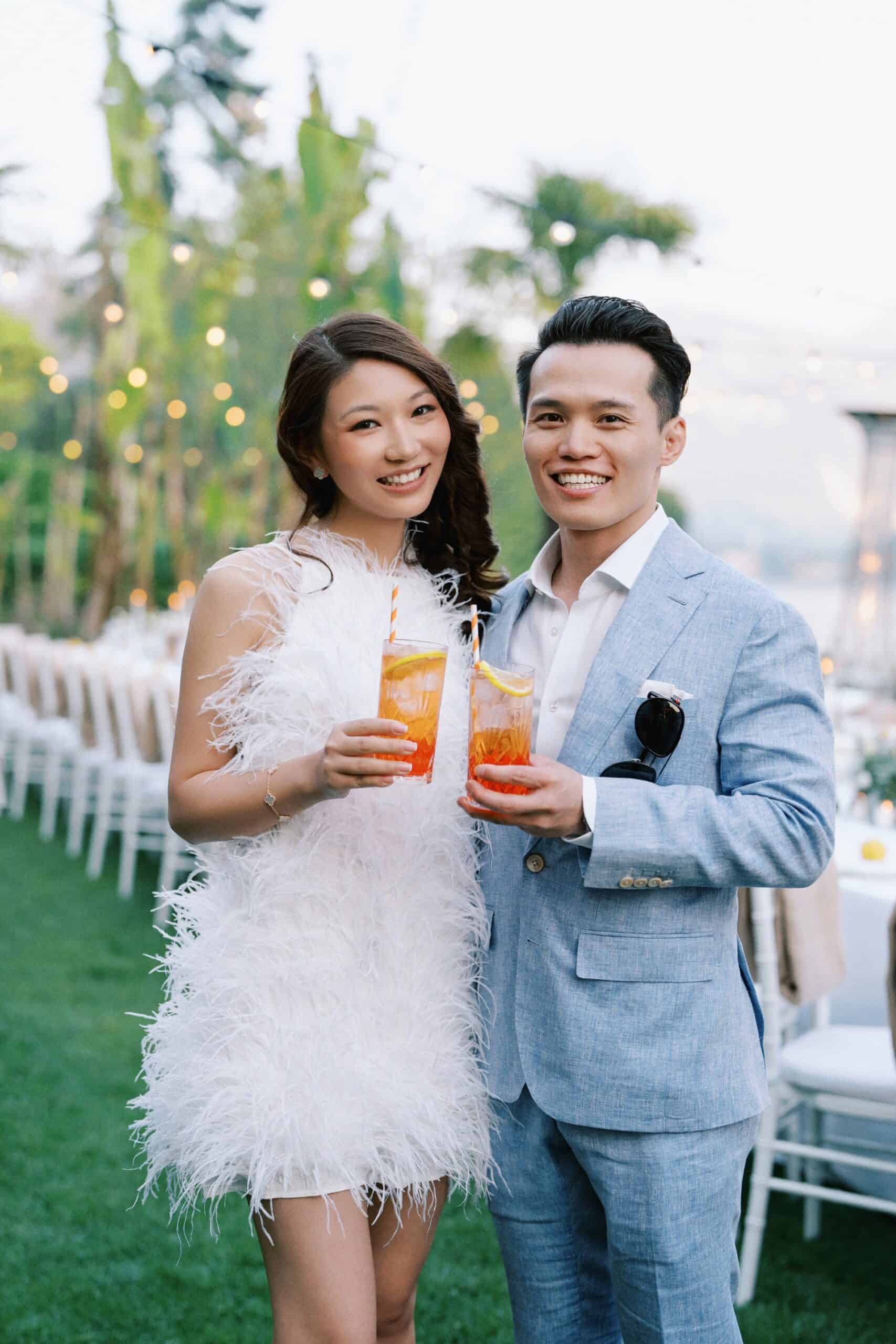 Jenn and Huan laughing at pre-wedding dinner