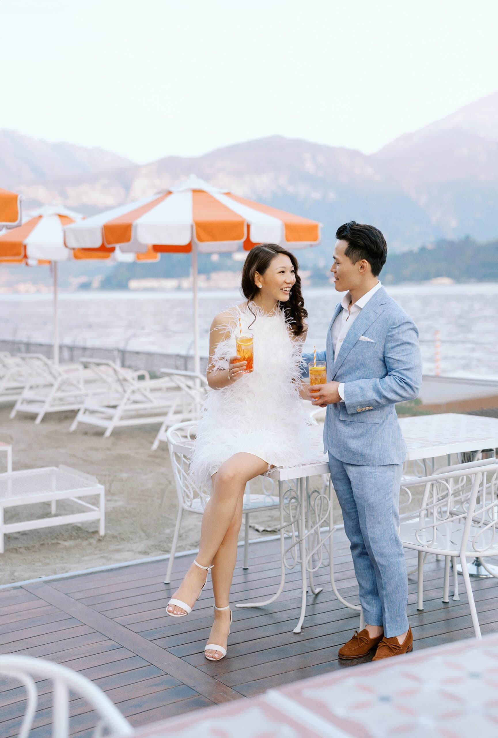 Bride and groom on the Lake Como waterfront 