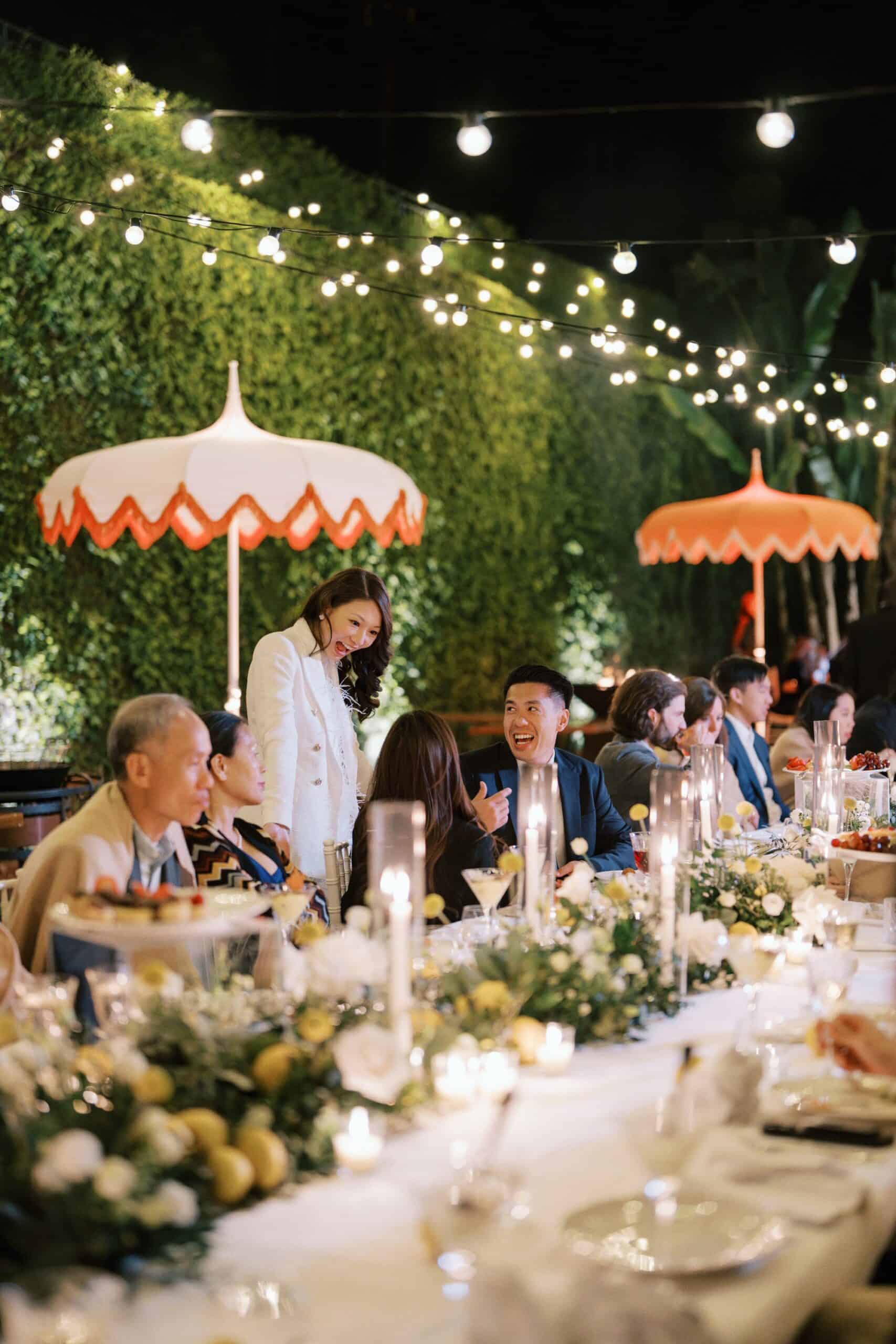 Joyful toast among friends at a pre-wedding dinner